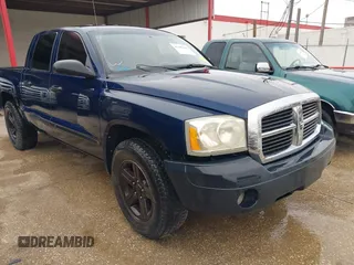 2007 Dodge Dakota SLT with VIN 1D7HE48K07S137252, listed as a IAAI auction lot 41385640 with 223,920 mi miles and . Bid and sale history available at carsss.com. Image 1.