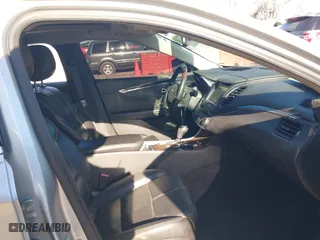 2014 Chevrolet Impala LTZ with VIN 2G1155S32E9282710, listed as a IAAI auction lot 41250424 with 154,486 mi miles. Bid and sale history available at carsss.com. Image 5.