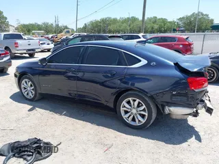 2016 Chevrolet Impala LT with VIN 2G1105SA9G9207051, listed as a IAAI auction lot 42032153 with 82,895 mi miles and . Bid and sale history available at DreamBid. Image 14.