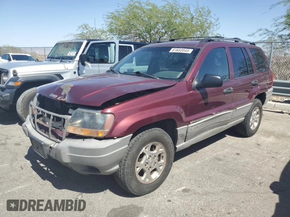 2000 Jeep Grand Cherokee Laredo with VIN 1J4G248S1YC407769, listed as a Copart auction lot 61653545 with 188,882 mi miles and Salvage title. Bid and sale history available at DreamBid. Image 1.