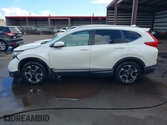 2018 Honda CR-V Touring with VIN 2HKRW1H96JH506435, listed as a IAAI auction lot 41228873 with 11,585 mi miles and . Bid and sale history available at DreamBid. Image 15.