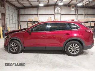 2019 Mazda CX-9 Touring with VIN JM3TCACY1K0331904, listed as a IAAI auction lot 42146945 with 77,699 mi miles and . Bid and sale history available at DreamBid. Image 14.