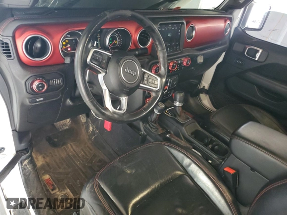2020 Jeep Gladiator Rubicon z VIN 1C6JJTBG4LL102523, wystawiony jako Copart lot #54735955 z przebiegiem 104 579 mil mil oraz Szkoda całkowita • Salvage title. Historia ofert i sprzedaży dostępna na DreamBid. Obrazek 8.