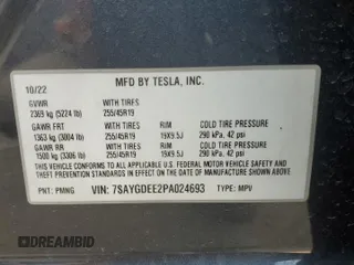 2023 Tesla Model Y Long Range with VIN 7SAYGDEE2PA024693, listed as a Copart auction lot 52595935 with 35,179 mi miles and Salvage Title. Bid and sale history available at DreamBid. Image 12.