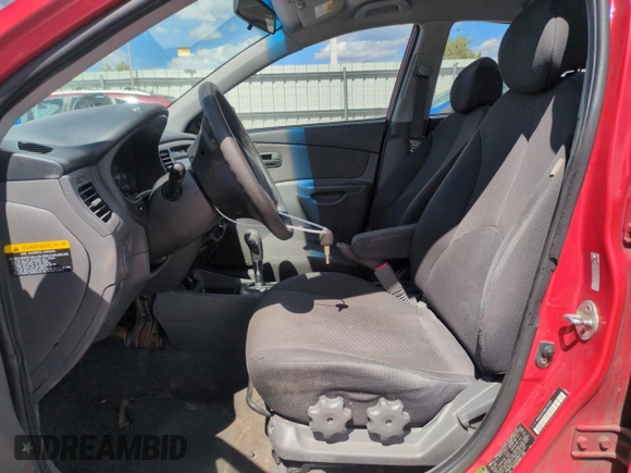 2008 Kia Rio LX with VIN KNADE123986373737, listed as a Copart auction lot 53919515 with 148,743 mi miles and Salvage Title. Bid and sale history available at DreamBid. Image 7.