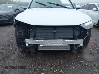 2023 Audi Q5 S line Premium Plus z VIN WA1EAAFY9P2089095, wystawiony jako IAAI lot #42263035 z przebiegiem 10 279 mil mil oraz . Historia ofert i sprzedaży dostępna na DreamBid. Obrazek 19.