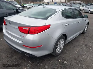 2014 Kia Optima EX with VIN 5XXGN4A7XEG304462, listed as a IAAI auction lot 41577127 with 198,894 mi miles. Bid and sale history available at carsss.com. Image 4.