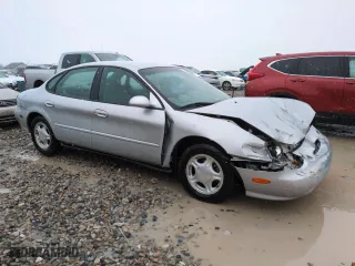 1998 Ford Taurus LX with VIN 1FAFP52U8WG232726, listed as a Copart auction lot 45687605 with 67,793 mi miles and Salvage Title. Bid and sale history available at carsss.com. Image 4.