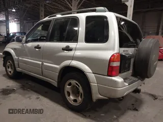 2002 Suzuki Grand Vitara JLX z VIN JS3TD62V324161291, wystawiony jako IAAI lot #41577344 z przebiegiem 164 658 mil mil oraz . Historia ofert i sprzedaży dostępna na DreamBid. Obrazek 3.