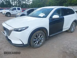 2018 Mazda CX-9 Touring with VIN JM3TCACY7J0222569, listed as a IAAI auction lot 42670932 with 130,644 mi miles and . Bid and sale history available at DreamBid. Image 2.