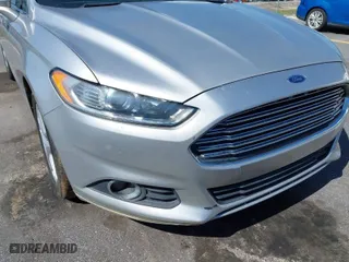 2013 Ford Fusion SE with VIN 3FA6P0HR4DR337047, listed as a IAAI auction lot 41997094 with 195,687 mi miles. Bid and sale history available at carsss.com. Image 12.