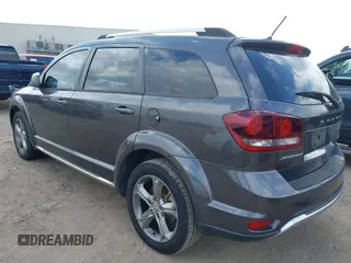 2016 Dodge Journey Crossroad Plus z VIN 3C4PDCGB1GT203035, wystawiony jako IAAI lot #41518100 z przebiegiem 147 437 mil mil oraz . Historia ofert i sprzedaży dostępna na DreamBid. Obrazek 3.
