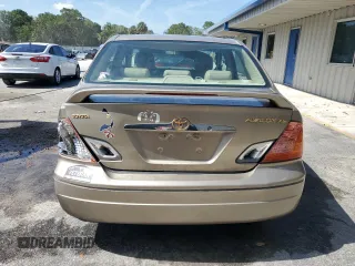 2002 Toyota Avalon XL z VIN 4T1BF28B72U261478, wystawiony jako Copart lot #57638745 z przebiegiem 146 479 mil mil oraz Szkody całkowita. Historia ofert i sprzedaży dostępna na DreamBid. Obrazek 6.