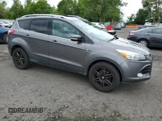 2013 Ford Escape Titanium с VIN 1FMCU9J92DUB97590, выставлен на аукционе Copart как лот 56235645 с пробегом 164 613 миль миль и Списание • Salvage title. История ставок и продаж доступна на DreamBid. Изображение 4.