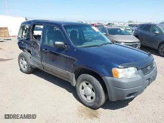 2003 Ford Escape XLS Popular with VIN 1FMYU92143KB89726, listed as a IAAI auction lot 42002613 with 95,586 mi miles. Bid and sale history available at carsss.com. Image 1.