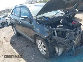 2012 Kia Sorento LX with VIN 5XYKT3A62CG306961, listed as a IAAI auction lot 41858307 with 152,344 mi miles. Bid and sale history available at carsss.com. Image 1.