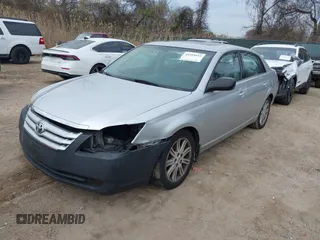 2007 Toyota Avalon XL with VIN 4T1BK36B57U174223, listed as a IAAI auction lot 41910541 with 220,304 mi miles. Bid and sale history available at carsss.com. Image 2.