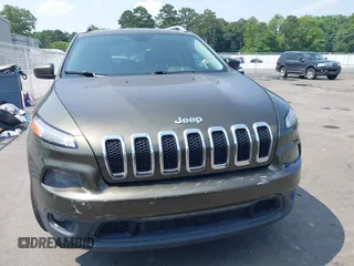 2015 Jeep Cherokee Latitude z VIN 1C4PJMCS9FW551694, wystawiony jako IAAI lot #42424992 z przebiegiem 125 852 mil mil oraz . Historia ofert i sprzedaży dostępna na DreamBid. Obrazek 12.
