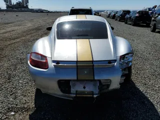 2007 Porsche 718 Cayman z VIN WP0AA29817U760642, wystawiony jako Copart lot #43905015 z przebiegiem Nie podano mil oraz Szkoda całkowita • Salvage title. Historia ofert i sprzedaży dostępna na DreamBid. Obrazek 6.