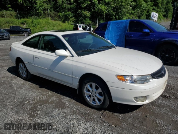 2000 Toyota Solara SE z VIN 2T1CF28P2YC378976, wystawiony jako Copart lot #61400195 z przebiegiem 197 090 mil mil oraz Czysty tytuł • Clean title. Historia ofert i sprzedaży dostępna na DreamBid. Obrazek 4.