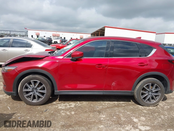 2018 Mazda CX-5 Grand Touring with VIN JM3KFADM7J1357401, listed as a IAAI auction lot 42106012 with 119,420 mi miles and . Bid and sale history available at DreamBid. Image 14.