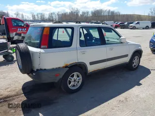 1999 Honda CR-V EX with VIN JHLRD186XXC042293, listed as a IAAI auction lot 42046143 with 276,290 mi miles. Bid and sale history available at carsss.com. Image 4.