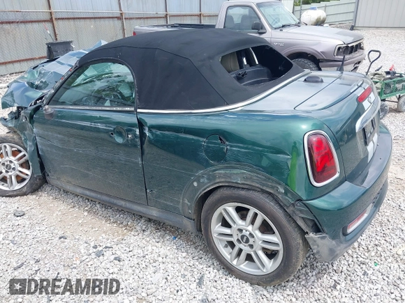 2013 MINI Roadster S z VIN WMWSY3C55DT566134, wystawiony jako IAAI lot #42265800 z przebiegiem 170 001 mil mil oraz . Historia ofert i sprzedaży dostępna na DreamBid. Obrazek 3.