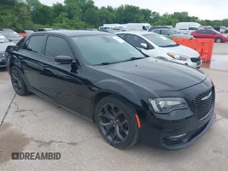 2021 Chrysler 300 with VIN 2C3CCABG8MH524121, listed as a IAAI auction lot 42119886 with 84,593 mi miles. Bid and sale history available at carsss.com. Image 1.