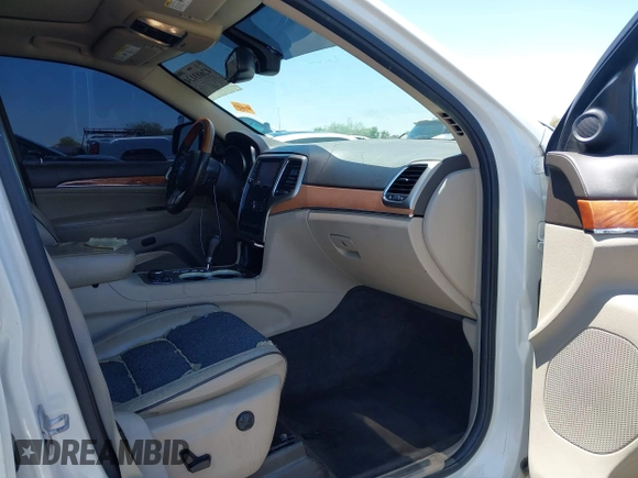 2011 Jeep Grand Cherokee Overland with VIN 1J4RR6GT2BC647589, listed as a IAAI auction lot 42603134 with 153,570 mi miles and . Bid and sale history available at DreamBid. Image 5.