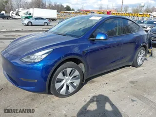 2022 Tesla Model Y Long Range with VIN 7SAYGAEE5NF517234, listed as a IAAI auction lot 41706191 with NaN miles. Bid and sale history available at carsss.com. Image 24.
