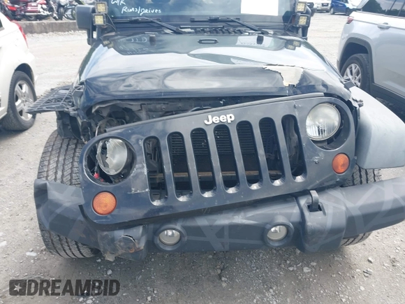 2012 Jeep Wrangler Unlimited Sport with VIN 1C4BJWDG0CL233718, listed as a IAAI auction lot 42551935 with 227,693 mi miles and . Bid and sale history available at DreamBid. Image 6.