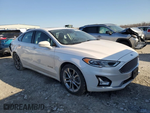 2019 Ford Fusion Hybrid Titanium with VIN 3FA6P0RU0KR277431, listed as a Copart auction lot 48234545 with 87,043 mi miles and Salvage Title. Bid and sale history available at carsss.com. Image 4.