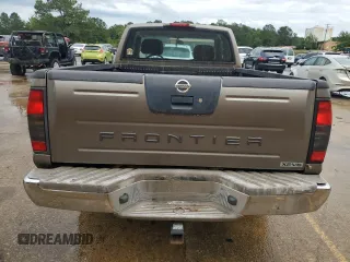 2004 Nissan Frontier XE Desert Runner z VIN 1N6ED26T84C448365, wystawiony jako Copart lot #56487435 z przebiegiem 266 738 mil mil oraz Tytuł czysty. Historia ofert i sprzedaży dostępna na DreamBid. Obrazek 6.