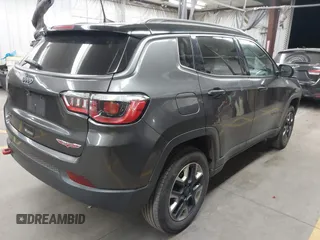 2018 Jeep Compass Trailhawk with VIN 3C4NJDDB5JT451600, listed as a IAAI auction lot 41893541 with 155,528 mi miles and . Bid and sale history available at DreamBid. Image 4.