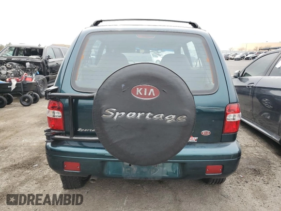 1999 Kia Sportage with VIN KNDJB7232X5612065, listed as a Copart auction lot 47575445 with 77,486 mi miles and Clean Title. Bid and sale history available at carsss.com. Image 6.