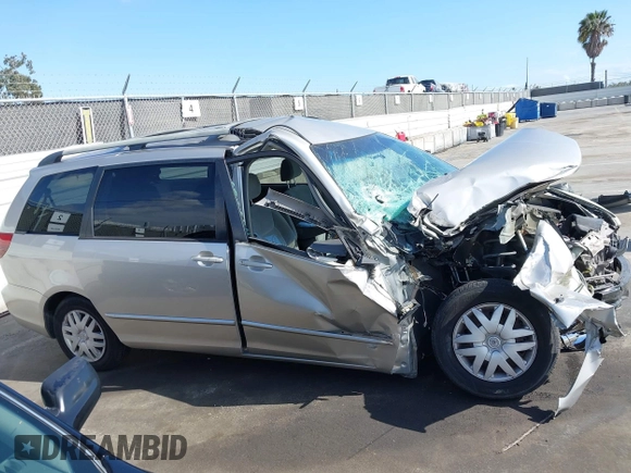 2005 Toyota Sienna CE with VIN 5TDZA23C95S261007, listed as a IAAI auction lot 42130492 with 215,717 mi miles and . Bid and sale history available at DreamBid. Image 13.