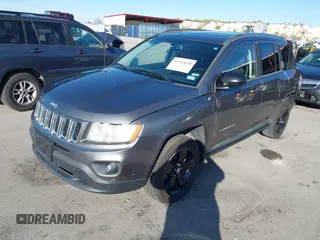 2011 Jeep Compass with VIN 1J4NT1FA0BD246586, listed as a IAAI auction lot 41253630 with 120,540 mi miles. Bid and sale history available at carsss.com. Image 17.