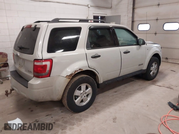 2008 Ford Escape XLT with VIN 1FMCU93128KC67338, listed as a IAAI auction lot 42099606 with 188,817 mi miles. Bid and sale history available at carsss.com. Image 4.