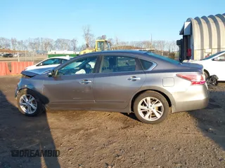 2015 Nissan Altima 2.5 S with VIN 1N4AL3AP9FC591869, listed as a IAAI auction lot 41826874 with 103,365 mi miles. Bid and sale history available at carsss.com. Image 14.