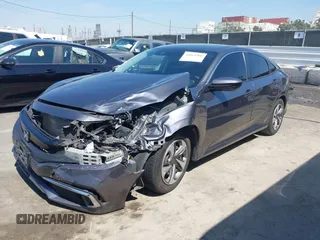 2020 Honda Civic LX with VIN 2HGFC2F67LH551651, listed as a IAAI auction lot 41861966 with 205,619 mi miles and . Bid and sale history available at DreamBid. Image 17.