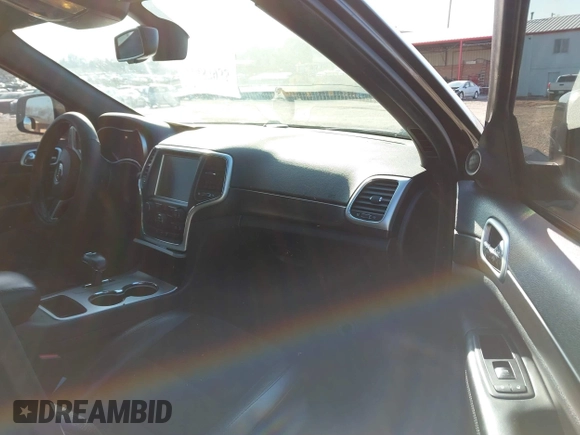 2015 Jeep Grand Cherokee Laredo with VIN 1C4RJFAG6FC171751, listed as a IAAI auction lot 41487935 with 134,113 mi miles. Bid and sale history available at carsss.com. Image 5.