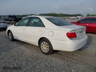 2005 Toyota Camry STD with VIN 4T1BE32K85U401432, listed as a IAAI auction lot 42093301 with 228,557 mi miles. Bid and sale history available at carsss.com. Image 3.