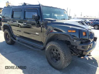 2003 Hummer H2 with VIN 5GRGN23U73H122529, listed as a Copart auction lot 50157934 with 0 mi miles and Salvage Title. Bid and sale history available at carsss.com. Image 4.