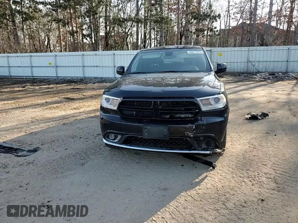 2015 Dodge Durango Special Service with VIN 1C4RDJFG2FC193572, listed as a Copart auction lot 48817575 with 210,420 mi miles and Salvage title. Bid and sale history available at DreamBid. Image 11.