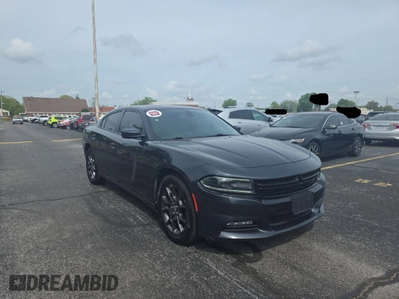 2018 Dodge Charger GT with VIN 2C3CDXJG2JH283203, listed as a Copart auction lot 54701315 with 172,636 mi miles and Clean Title. Bid and sale history available at carsss.com. Image 1.