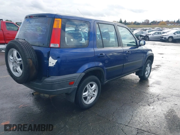 1999 Honda CR-V EX with VIN JHLRD1863XC046654, listed as a IAAI auction lot 40871270 with 220,642 mi miles. Bid and sale history available at carsss.com. Image 4.