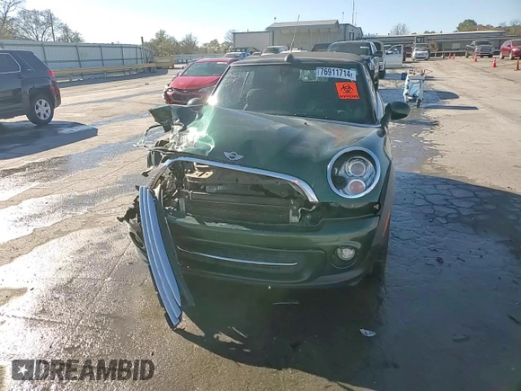 2015 MINI Convertible with VIN WMWZN3C53FT862148, listed as a Copart auction lot 76911714 with 56,065 mi miles and Salvage title. Bid and sale history available at DreamBid. Image 13.