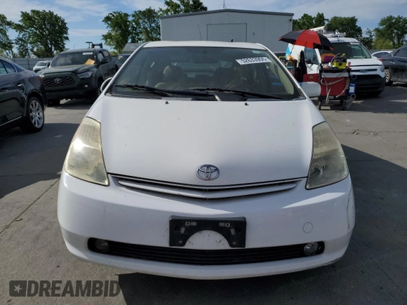 2004 Toyota Prius with VIN JTDKB20U340078473, listed as a Copart auction lot 52633955 with 146,932 mi miles and Salvage Title. Bid and sale history available at DreamBid. Image 5.