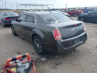 2014 Chrysler 300 S with VIN 2C3CCAGG5EH201509, listed as a IAAI auction lot 42292680 with 162,674 mi miles and . Bid and sale history available at DreamBid. Image 3.
