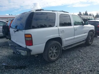 2001 Chevrolet Tahoe LT with VIN 1GNEK13T31J218674, listed as a IAAI auction lot 41529355 with 231,756 mi miles. Bid and sale history available at carsss.com. Image 4.